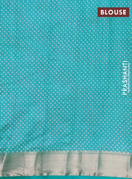 Semi raw silk saree teal blue with allover butta prints and zari woven border