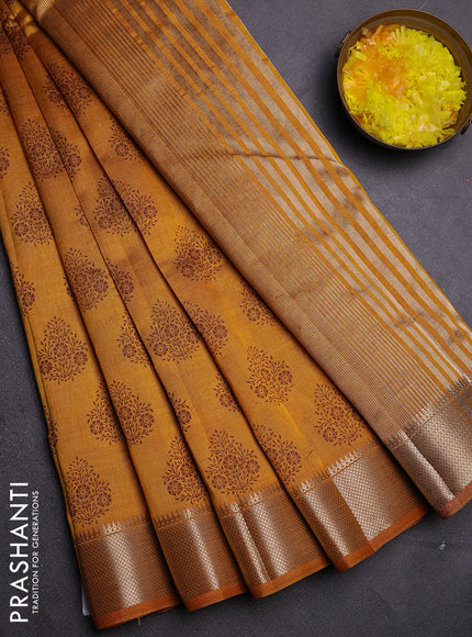 Semi raw silk saree mustard yellow with allover butta prints and zari woven border
