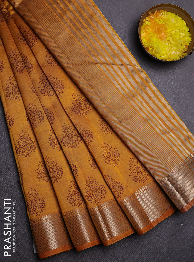 Semi raw silk saree mustard yellow with allover butta prints and zari woven border