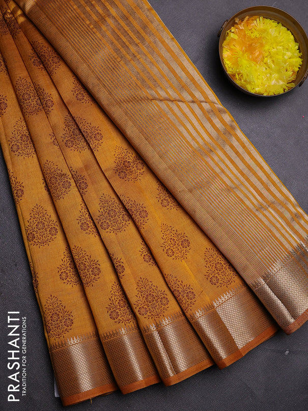 Semi raw silk saree mustard yellow with allover butta prints and zari woven border