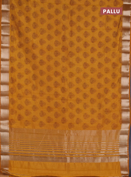 Semi raw silk saree mustard yellow with allover butta prints and zari woven border
