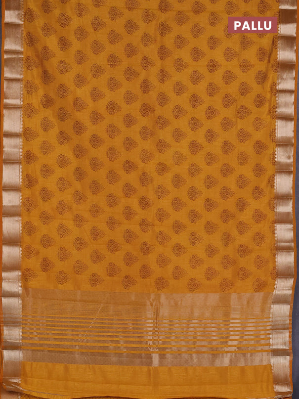Semi raw silk saree mustard yellow with allover butta prints and zari woven border
