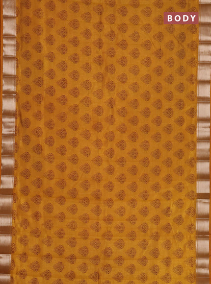 Semi raw silk saree mustard yellow with allover butta prints and zari woven border