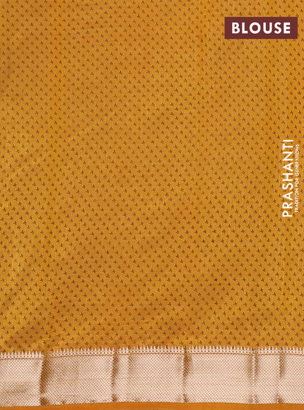 Semi raw silk saree mustard yellow with allover butta prints and zari woven border