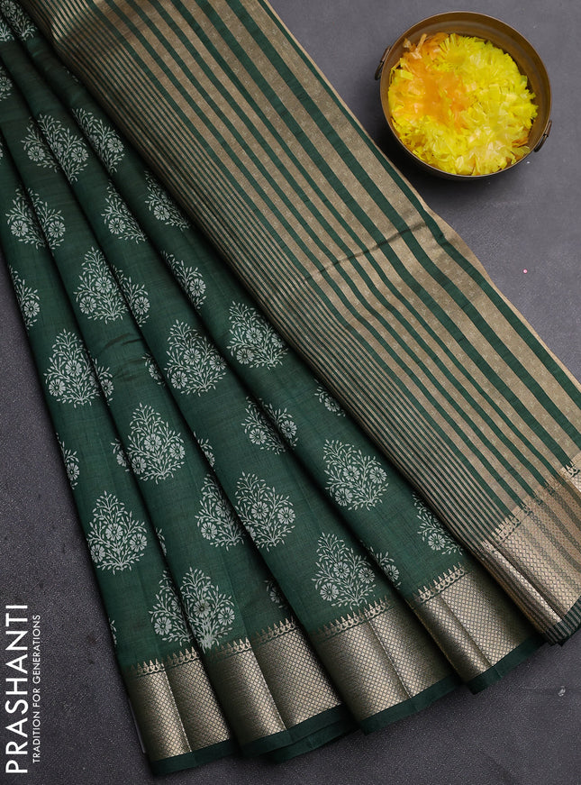 Semi raw silk saree bottle green with allover butta prints and zari woven border