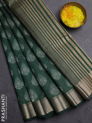 Semi raw silk saree bottle green with allover butta prints and zari woven border