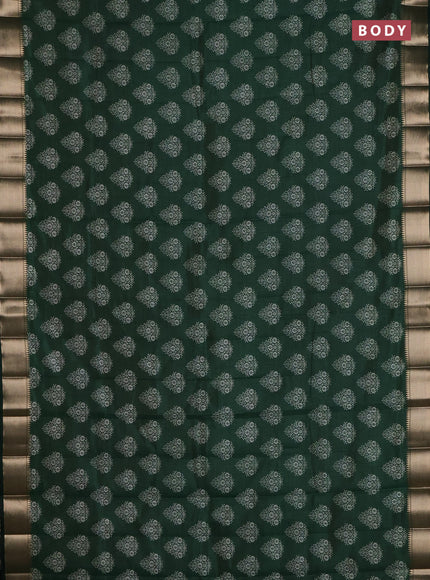 Semi raw silk saree bottle green with allover butta prints and zari woven border