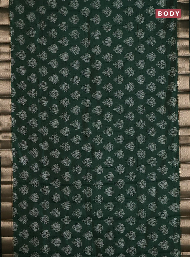 Semi raw silk saree bottle green with allover butta prints and zari woven border