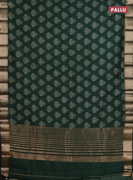 Semi raw silk saree bottle green with allover butta prints and zari woven border