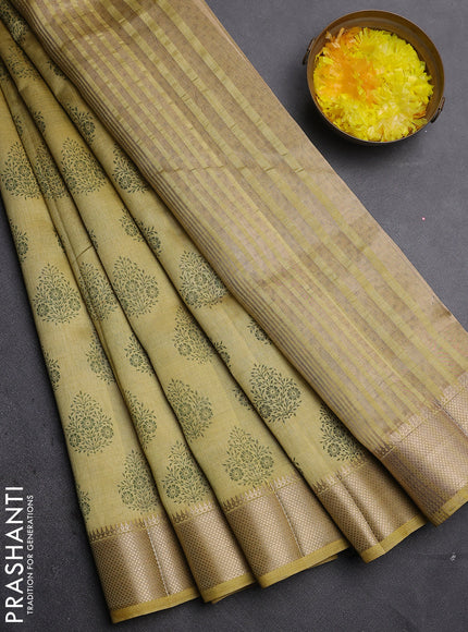 Semi raw silk saree mustard shade with allover butta prints and zari woven border