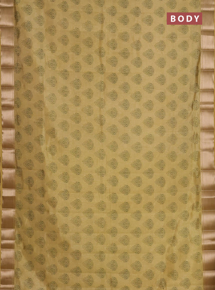 Semi raw silk saree mustard shade with allover butta prints and zari woven border