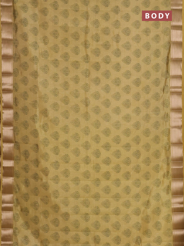 Semi raw silk saree mustard shade with allover butta prints and zari woven border