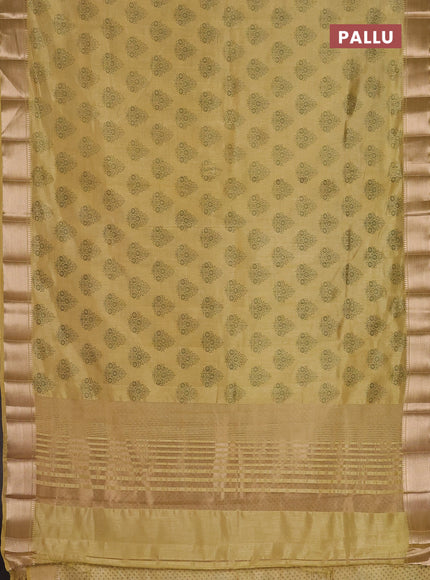 Semi raw silk saree mustard shade with allover butta prints and zari woven border