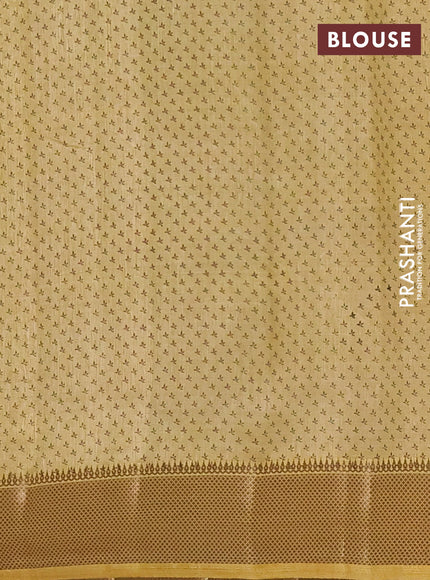 Semi raw silk saree mustard shade with allover butta prints and zari woven border