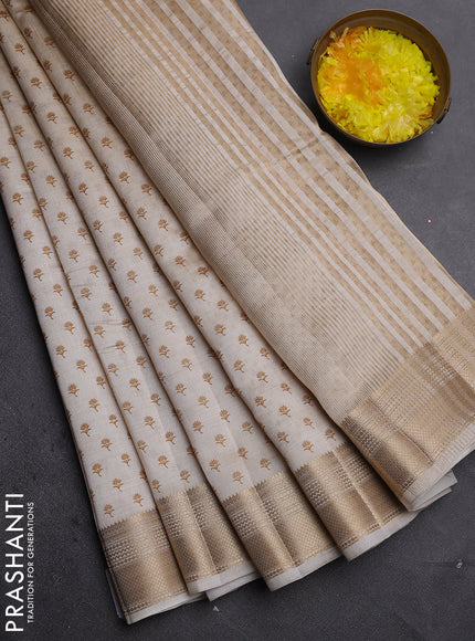 Semi raw silk saree cream with allover butta prints and zari woven border