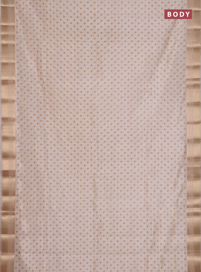 Semi raw silk saree cream with allover butta prints and zari woven border