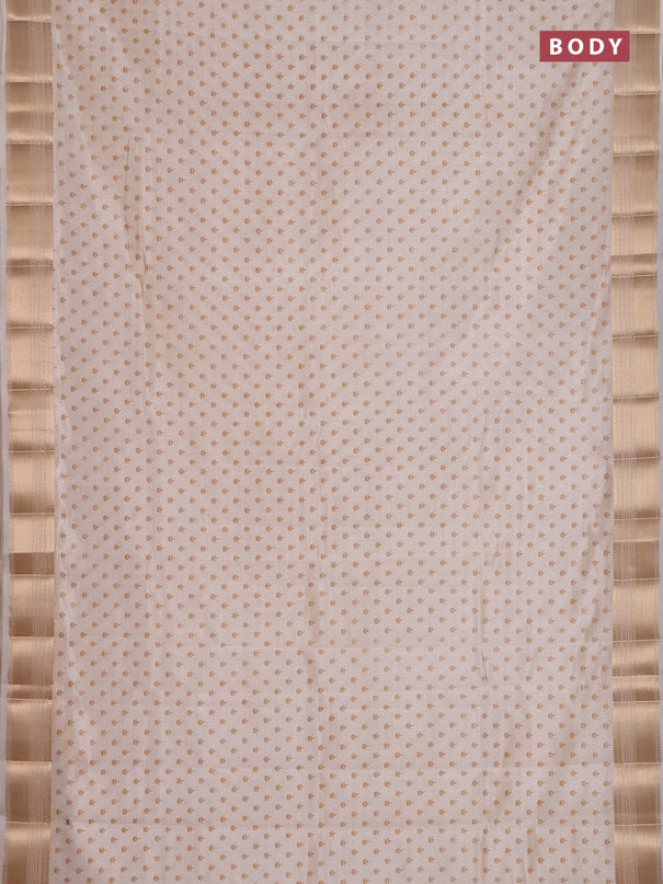 Semi raw silk saree cream with allover butta prints and zari woven border