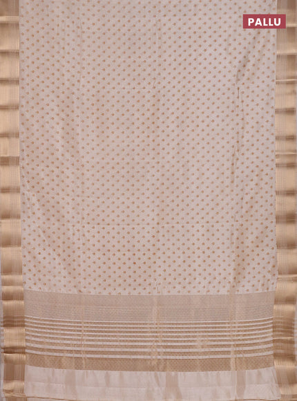 Semi raw silk saree cream with allover butta prints and zari woven border