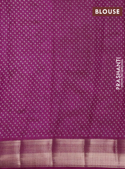 Semi raw silk saree deep purple with allover butta prints and zari woven border