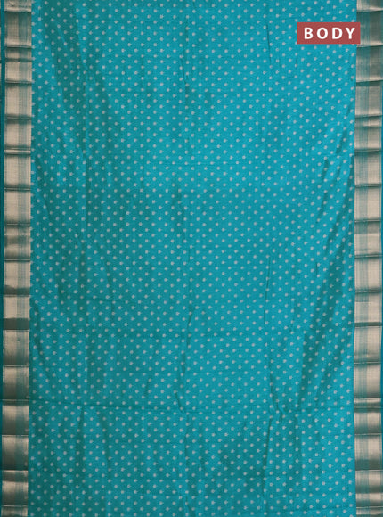 Semi raw silk saree teal blue with allover butta prints and zari woven border