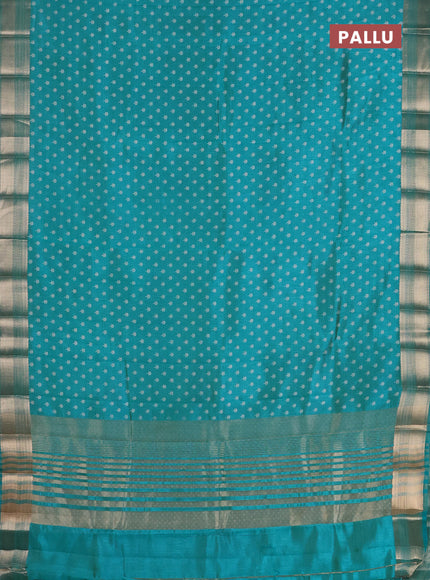 Semi raw silk saree teal blue with allover butta prints and zari woven border
