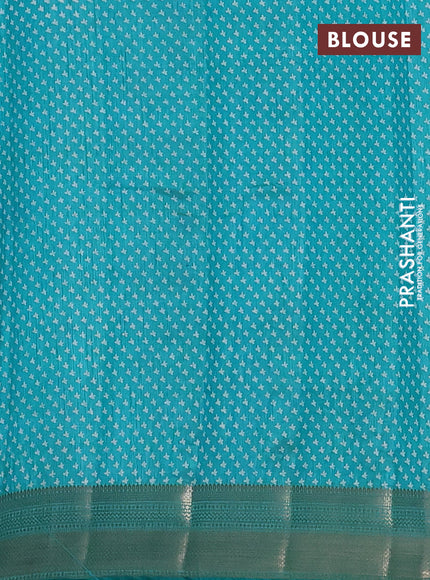 Semi raw silk saree teal blue with allover butta prints and zari woven border