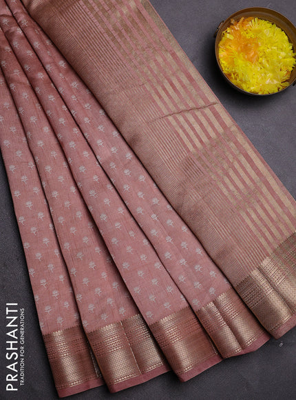 Semi raw silk saree pastel peach with allover butta prints and zari woven border