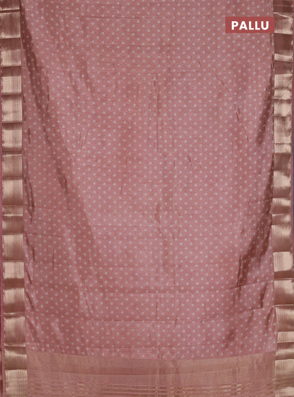 Semi raw silk saree pastel peach with allover butta prints and zari woven border
