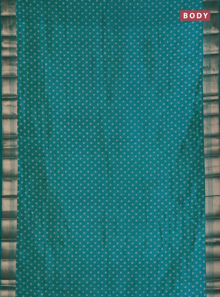 Semi raw silk saree teal blue with allover butta prints and zari woven border