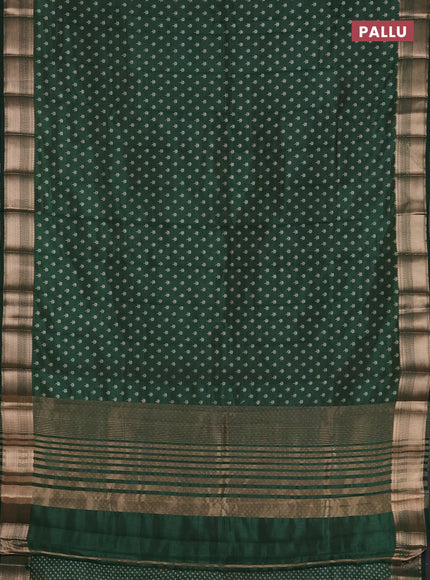 Semi raw silk saree bottle green with allover butta prints and zari woven border