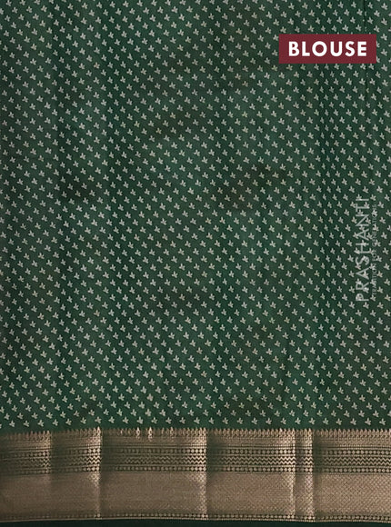 Semi raw silk saree bottle green with allover butta prints and zari woven border