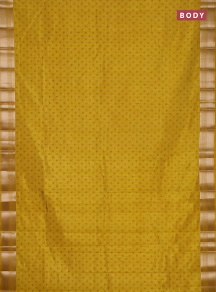 Semi raw silk saree mustard yellow with allover butta prints and zari woven border