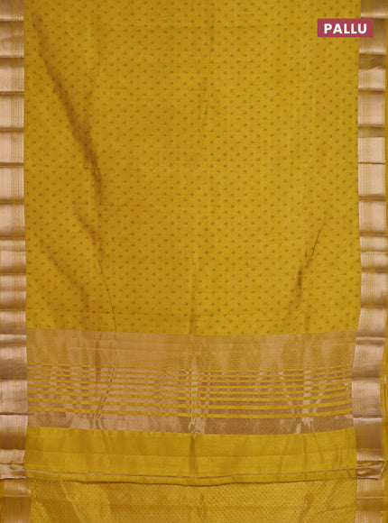 Semi raw silk saree mustard yellow with allover butta prints and zari woven border