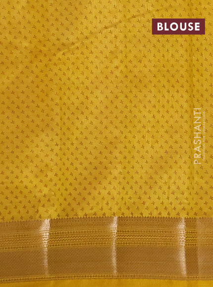 Semi raw silk saree mustard yellow with allover butta prints and zari woven border