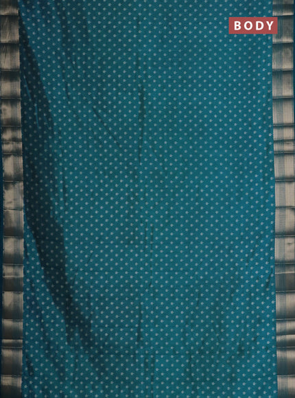 Semi raw silk saree cs blue with allover butta prints and zari woven border