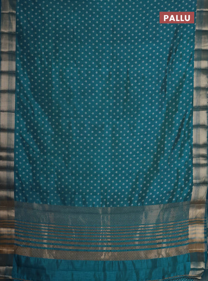 Semi raw silk saree cs blue with allover butta prints and zari woven border