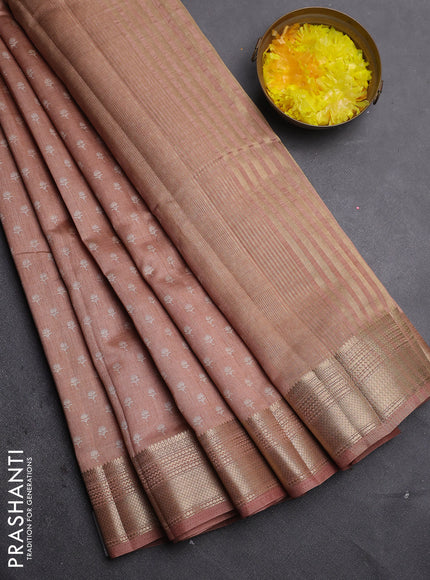 Semi raw silk saree pastel peach with allover butta prints and zari woven border