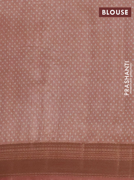Semi raw silk saree pastel peach with allover butta prints and zari woven border
