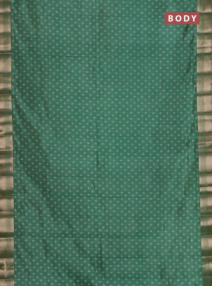 Semi raw silk saree light green with allover butta prints and zari woven border