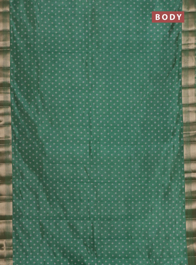 Semi raw silk saree light green with allover butta prints and zari woven border