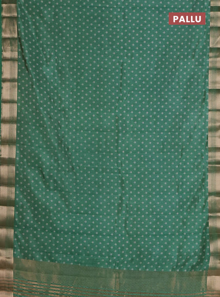 Semi raw silk saree light green with allover butta prints and zari woven border