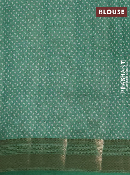 Semi raw silk saree light green with allover butta prints and zari woven border