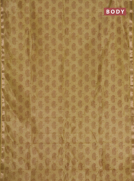 Semi raw silk saree mustard shade with allover butta prints and zari woven border