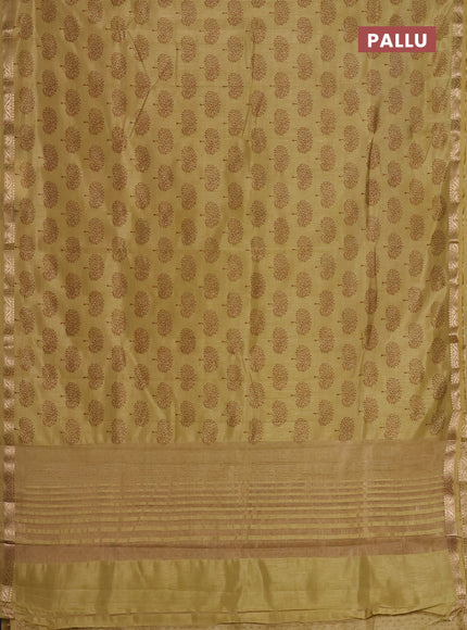 Semi raw silk saree mustard shade with allover butta prints and zari woven border
