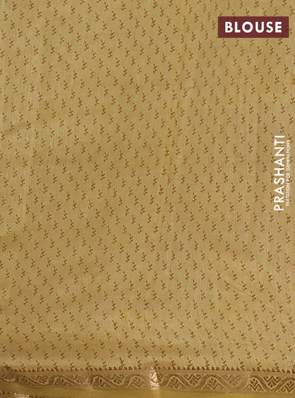 Semi raw silk saree mustard shade with allover butta prints and zari woven border