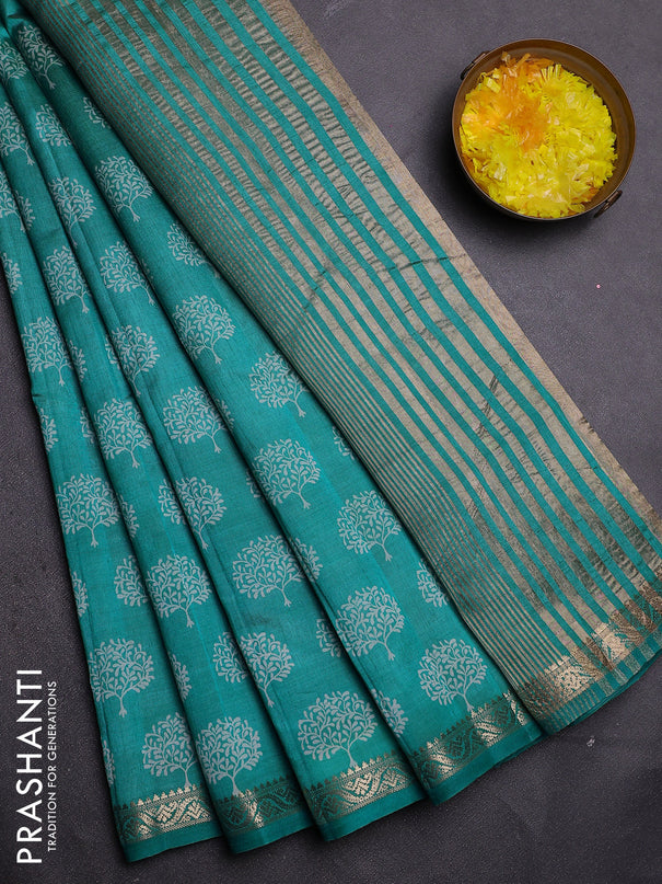 Semi raw silk saree teal blue with allover butta prints and zari woven border