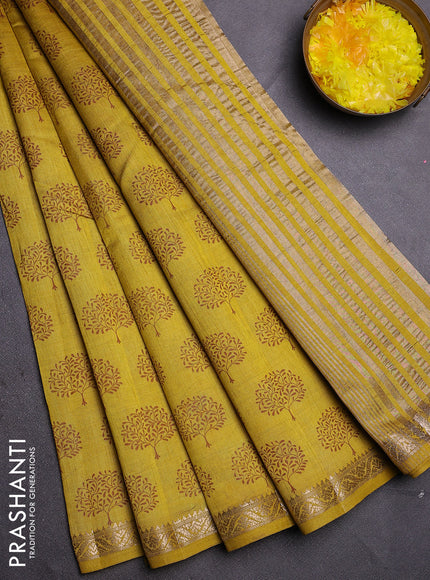 Semi raw silk saree lime yellow with allover butta prints and zari woven border
