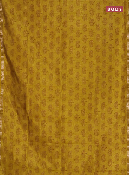 Semi raw silk saree lime yellow with allover butta prints and zari woven border
