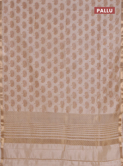 Semi raw silk saree cream with allover butta prints and zari woven border