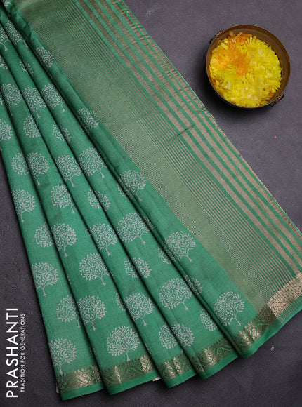 Semi raw silk saree green with allover butta prints and zari woven border